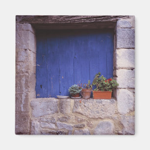 Europe, France, Cereste. A blue door adds colour Magnet