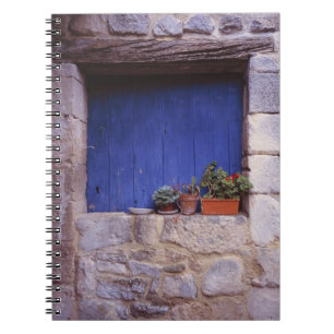 Europe, France, Cereste. A blue door adds colour Notebook
