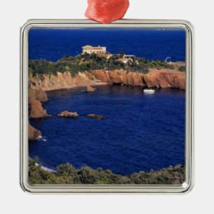 Europe, France, Theoule-sur-Mer. A tile-roofed Metal Tree Decoration