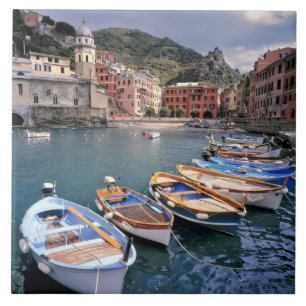 Europe, Italy, Vernazza. Brightly painted boats Tile