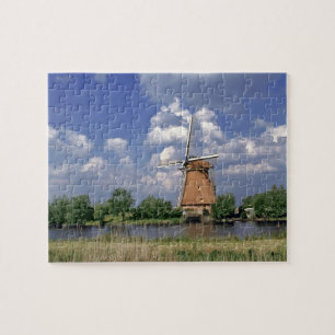 Europe, Netherlands, Kinerdijk. A windmill sits Jigsaw Puzzle