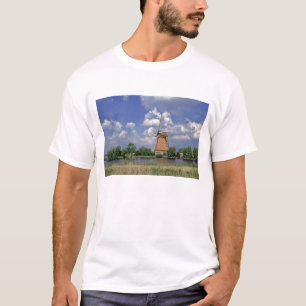 Europe, Netherlands, Kinerdijk. A windmill sits T-Shirt