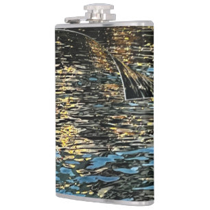 Evening lights on the sea hip flask