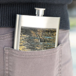 Evening lights on the sea hip flask