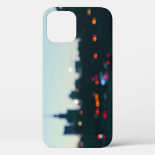 Evening Warsaw: Blurry Cityscape Silhouette. iPhone 12 Case