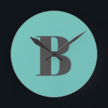Exclusive Light Teal Grey Monogram Initial Letter Round Clock<br><div class="desc">You Can Easily Change the Fonts,  Background Image and Colour,  Letter Characters.</div>