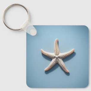 Exotic Starfish with Blue Background Key Ring