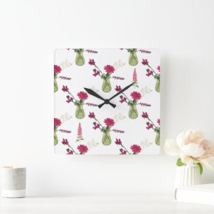 Exotisches Blumenarrangement im Glas Square Wall Clock