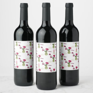 Exotisches Blumenarrangement im Glas Wine Label