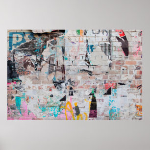 Exposed weathered brick wall with torn street post poster