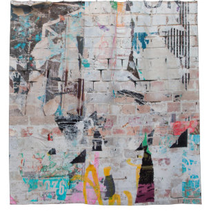 Exposed weathered brick wall with torn street post shower curtain