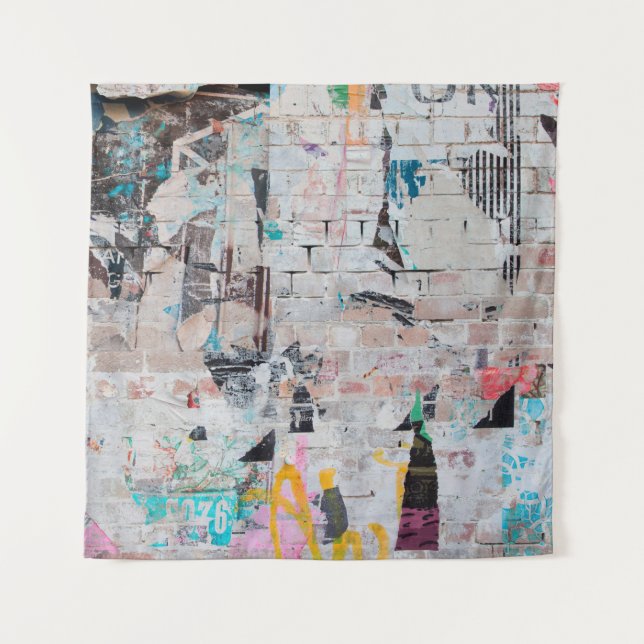 Exposed weathered brick wall with torn street post tapestry (Front)