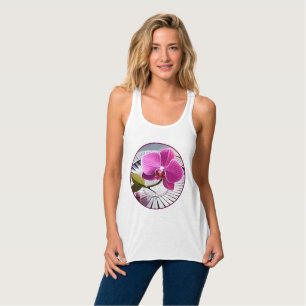 Exquisite Pink Orchid Rests on Silver Plate Singlet