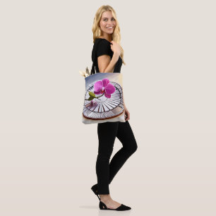Exquisite Pink Orchid Rests on Silver Plate Tote Bag