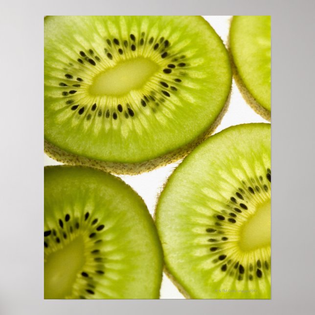 Extreme close-up of four pieces of sliced kiwi poster (Front)