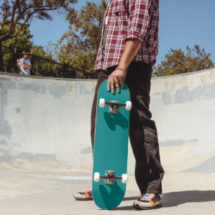 Eye-Catching Teal Skateboard for Kids Teens and Ad