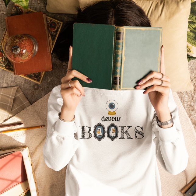 "Eye" Devour Books - Reading Ghosts Sweatshirt (This item is for display purposes only to illustrate the design element. )