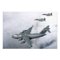 F-15B Eagles escort the first Hawaii-based C-17