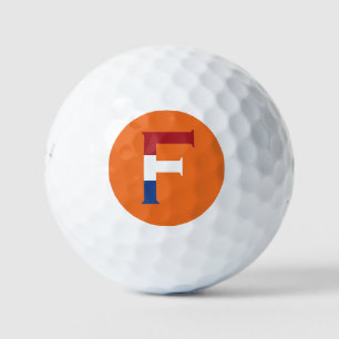 F Monogram overlaid on NLD Flag on or be6 gbcnt Golf Balls