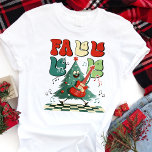 Fa La La Christmas Tree Guitar Retro Tri-Blend Shirt<br><div class="desc">Get into the festive groove with this fun and quirky "Fa La La" Christmas tree design. Featuring a retro-style Christmas tree rocking out on a guitar, this shirt is perfect for anyone who loves combining holiday cheer with a touch of vintage flair. Whether you're attending a Christmas party, lounging at...</div>