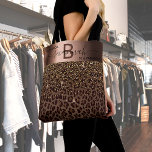 Fabulous birthday leopard pattern brown black tote bag<br><div class="desc">An elegant, glamourous and feminine 50th (or any age) birthday gift. With brown, golden and black leopard pattern, decorated with golden confetti. Personalise and add your name and monogram letter. With the text: 50 & Fabulous (x2) A faux bronze coloured band. Black and brown letters. The name is written with...</div>