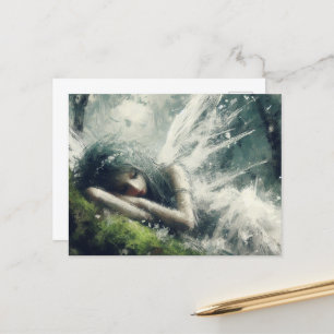 Fairy asleep on a mossy patch in the forest postcard