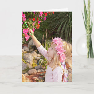 Fairy girl painting a flower card