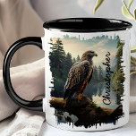 Falcon in Forest Wilderness  Mug<br><div class="desc">Enjoy your favourite beverage with the Falcon in Forest Wilderness Mug. This captivating mug features a detailed image of a falcon perched on a rock, surrounded by a serene forest and mountains in the background. Customised with your name, it adds a personal touch that makes it uniquely yours. Perfect for...</div>