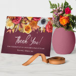 Fall Flowers 70th Birthday Folded Thank You Card<br><div class="desc">Elegant burgundy thank you card has a lush border of fall flowers across the top. Burnt orange, bright red, golden yellow and a pop of white. Thank you is written in a bright why trendy script. Two lines of text below let you customise your message. Of course there is room...</div>