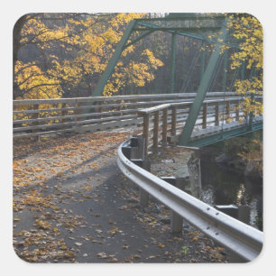 Fall foliage and a bridge over the Millers Square Sticker