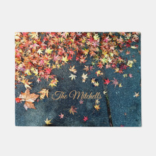 Fall leaves on pavement doormat