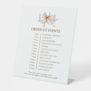Fall orange horseshoe wedding order of events pedestal sign