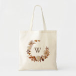 Fall Terracotta Watercolor Leaves Wreath Monogram Tote Bag<br><div class="desc">This elegant fall tote bag features hand-painted watercolor burnt orange and terracotta leaves, cream and beige dahlias, and beautiful rust-coloured roses perfect for an autumn wedding! The back and front have the same design. (This design is part of the Autumn Romance collection that can be viewed by clicking on the...</div>