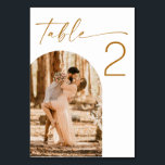 Fall Wedding | Double Sided Modern Arch Photo Table Number<br><div class="desc">Guide your guests with style using this personalised double sided wedding table number card. Featuring bold typography in a rich mustard brown and a modern arch photo frame, this design allows you to showcase two different photos - one on each side - for a meaningful and personal touch. Perfect for...</div>