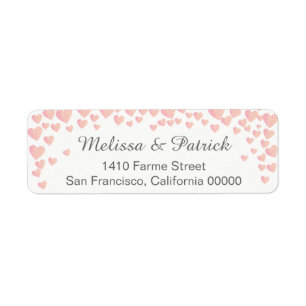 falling pink love hearts confetti on white wedding
