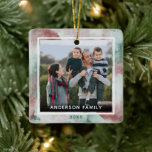 Family 2 Photo Elegant Watercolor Christmas Ceramic Ornament<br><div class="desc">This beautiful Christmas tree ornament features a square photo frame on both front and back. The front photo is on a red and green watercolor background and offers custom text for your name and year. The backside offers another square photo that fills the entire space. Photography © Storytree Studios, Stanford,...</div>