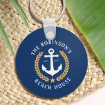 Family Name Beach House Anchor Gold Laurel Navy Key Ring<br><div class="desc">A stylish nautical style Keychain with your personalised family name and beach house, lake house, or other desired text and established date. Features a custom designed boat anchor with gold style laurel leaves and a star on navy blue or easily customise the base colour to match your current decor or...</div>