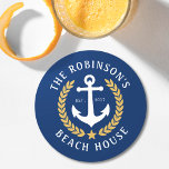 Family Name Beach House Anchor Gold Laurel Navy Round Paper Coaster<br><div class="desc">A stylish nautical themed set of paper coasters with your personalised family name and beach house, lake house, or other desired text and established date. Features a custom designed boat anchor with gold style laurel leaves and a star on classic navy blue or easily customise the base colour to match...</div>