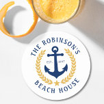Family Name Beach House Anchor Gold Laurel White Round Paper Coaster<br><div class="desc">A stylish nautical themed set of paper coasters with your personalised family name and beach house, lake house, or other desired text and established date. Features a custom designed boat anchor with gold style laurel leaves and a star on white or easily customise the base colour to match your current...</div>
