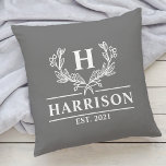 Family Name Monogram Laurel Year Established Gray Cushion<br><div class="desc">Add a touch of elegance to your home decor with our personalized monogram family name throw pillow featuring a beautiful laurel design. The pillow is customized with your family name and a personalized year established text, making it a perfect addition to your living room or bedroom. Made with high-quality materials,...</div>