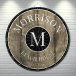 Family Rustic Wood Dartboard<br><div class="desc">This rustic dartboard is the perfect addition to your family beach house, lake house, game room, man cave, and more. It features a bold initial monogram at the centre, with your family name proudly displayed at the top. The bottom reads "Beach House, " but this can be customised to fit...</div>