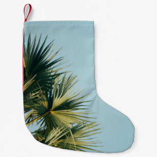 Fan palm tree under blue sky small christmas stocking
