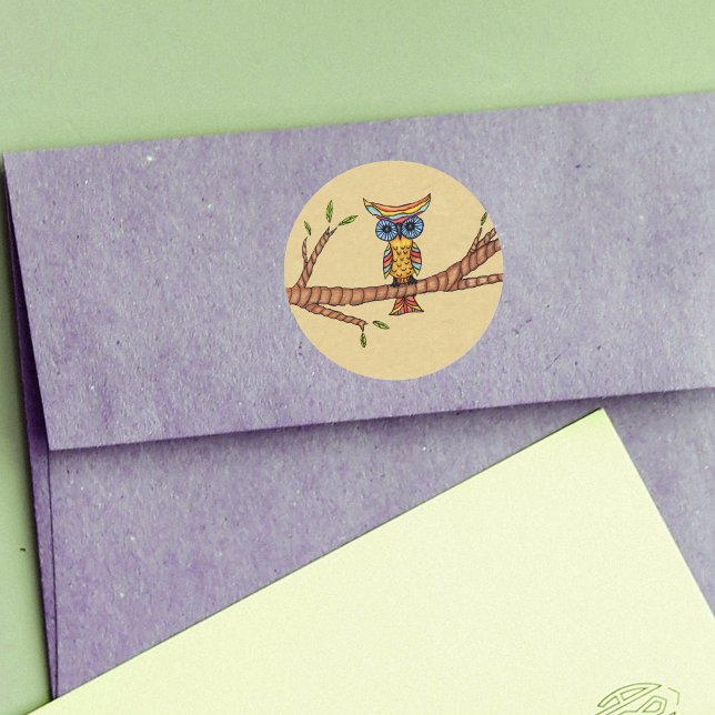 Fancy Colourful Owl Branch Classic Round Sticker (Fantasy owl colourful feathers blue eyes on branch with leaves on tan round stickers.)