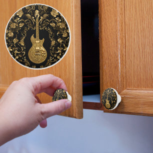 Fancy Gold Electric Guitar on Black Ceramic Knob