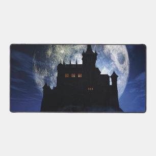 Fantasy castle during night desk mat