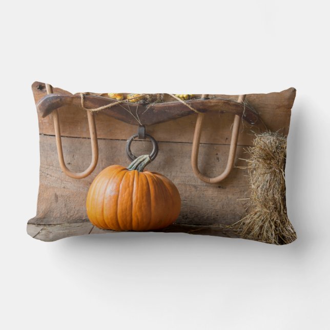 Farmers Museum. Pumpkin in barn with bale of hay Lumbar Cushion (Front)