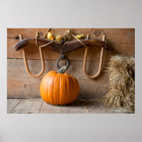 Farmers Museum. Pumpkin in barn with bale of hay