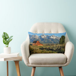 Farms   Barn Shadowed by Snow Capped Mountains Lumbar Cushion