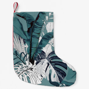 Fashionable seamless tropical pattern with tropica small christmas stocking