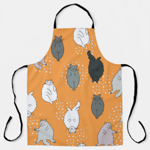 Fat, fluffy cats are lying on their backs. Cute co Apron
